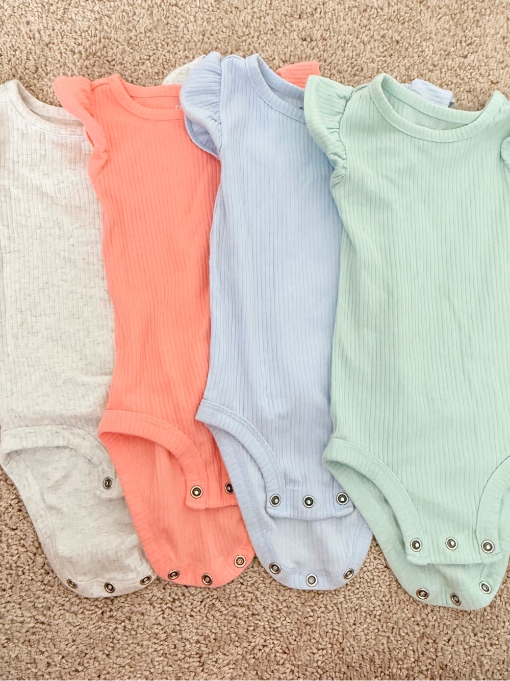 Carter’s 6mo 4-pack Ribbed Flutter-Sleeve One-Piece - Pastel Multi